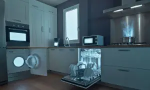 Cocina moderna con lavadora abierta, lavavajillas lleno y cocina encendida. ¡Todo funciona a la perfección con nuestra garantía lavadora!
