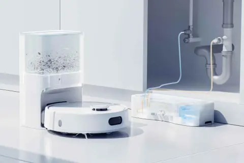 Tabla de soluciones Roomba: robot aspirador con base de autovaciado y sistema de conexión a desagüe para una limpieza sin interrupciones.