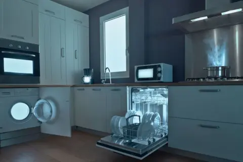 Cocina moderna con lavadora abierta, lavavajillas lleno y cocina encendida. ¡Todo funciona a la perfección con nuestra garantía lavadora!