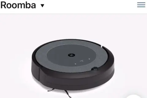Aspiradora Roomba negra, lista para limpiar tu hogar. Imagina controlarla con Alexa.