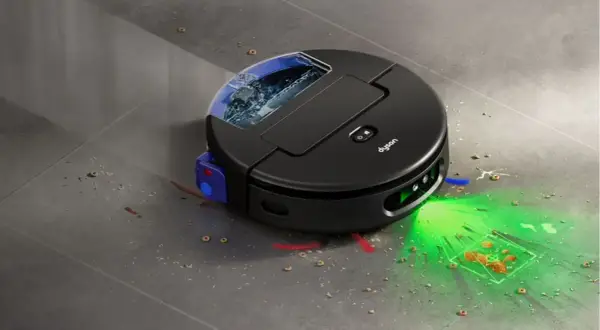 Robot aspirador Dyson limpiando migas y líquidos. La mejor roomba calidad precio para un hogar impecable.